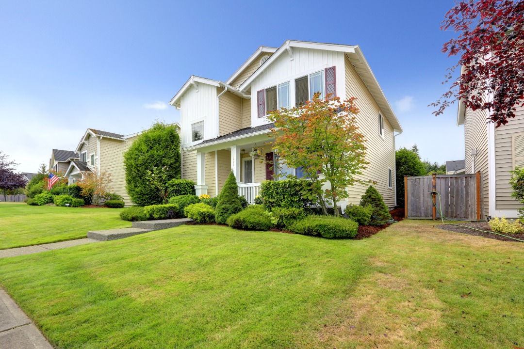 Well-kept front yard with lush natural grass enhances the landscape and boosts curb appeal around the home.
