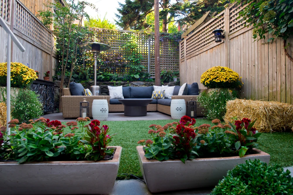 Small backyard patios with seating, built with proper construction on a stable base and well-drained surface.